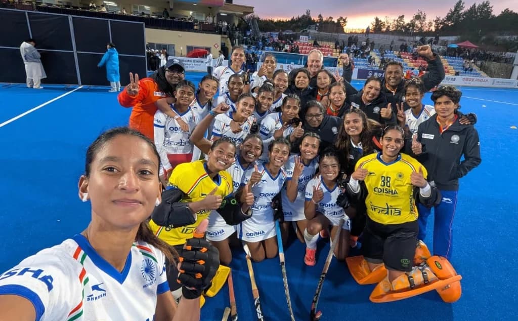 Indian Junior Women's Hockey Team celebratory group selfie on the turf field featuring Geeta Yadav from Bodla, Kawardha after clinching the AHF Junior Asia Cup title