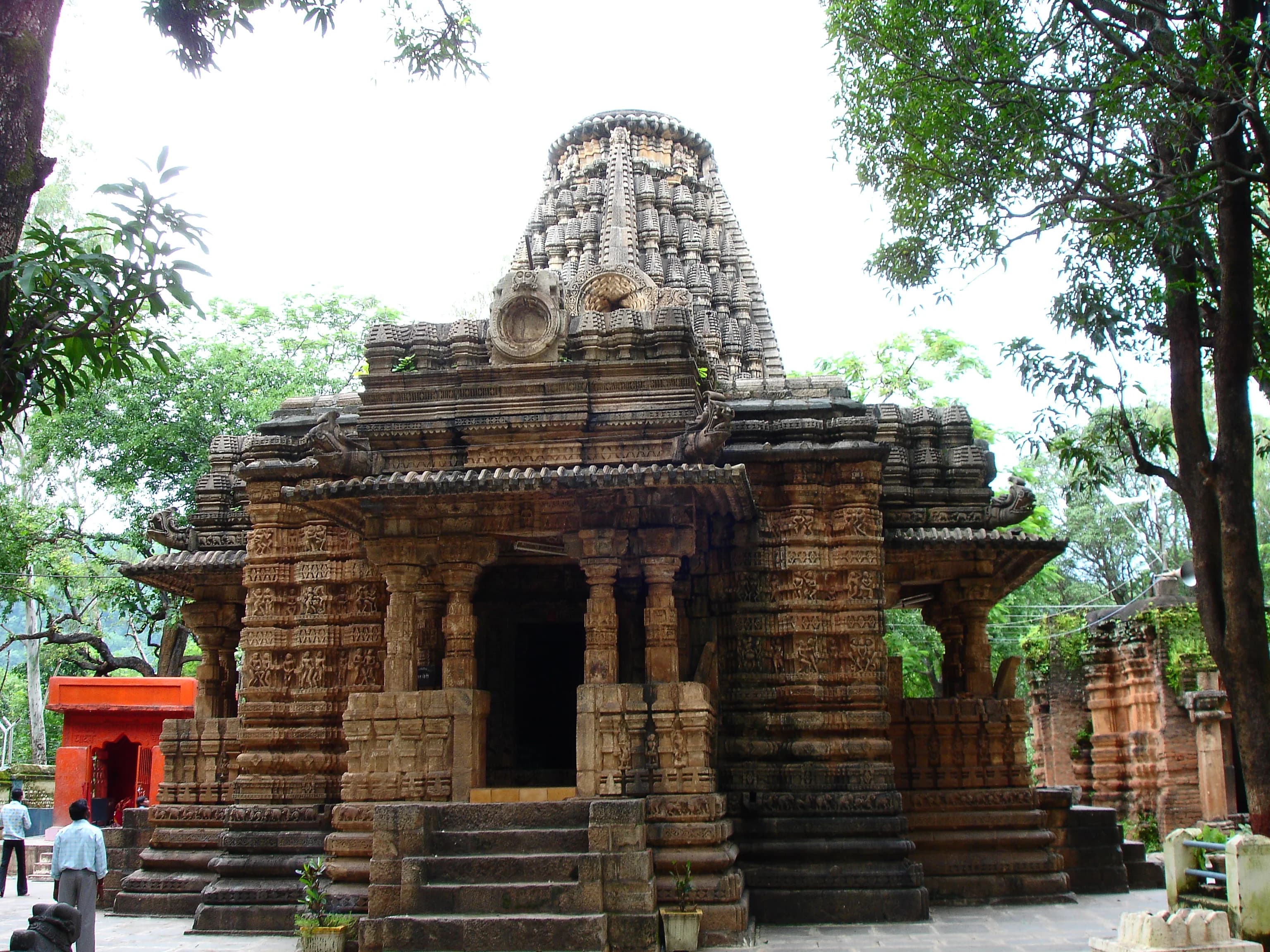 11th-century Nagara carved stone shikhara of Bhoramdeo Temple against Maikal Hills
