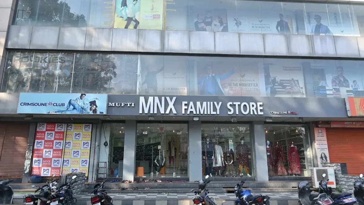 Multi-floor showroom facade of MNX Family Store on Raipur Road in Kawardha
