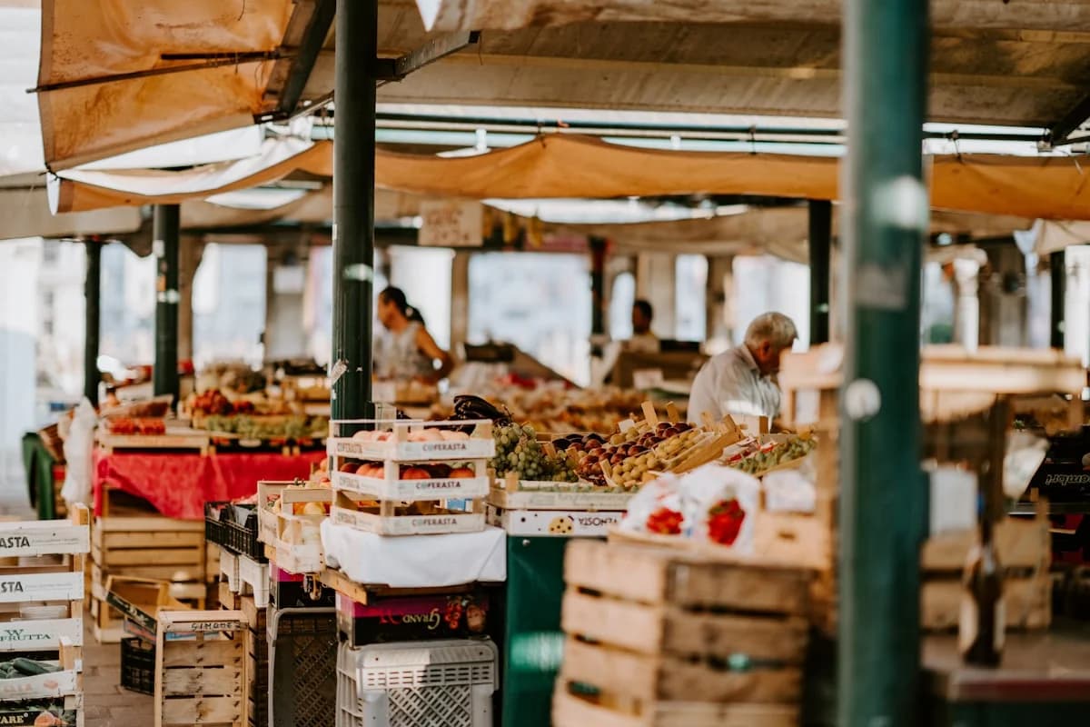 Lively street market stalls and brassware shops along Sadar Bazaar Kawardha