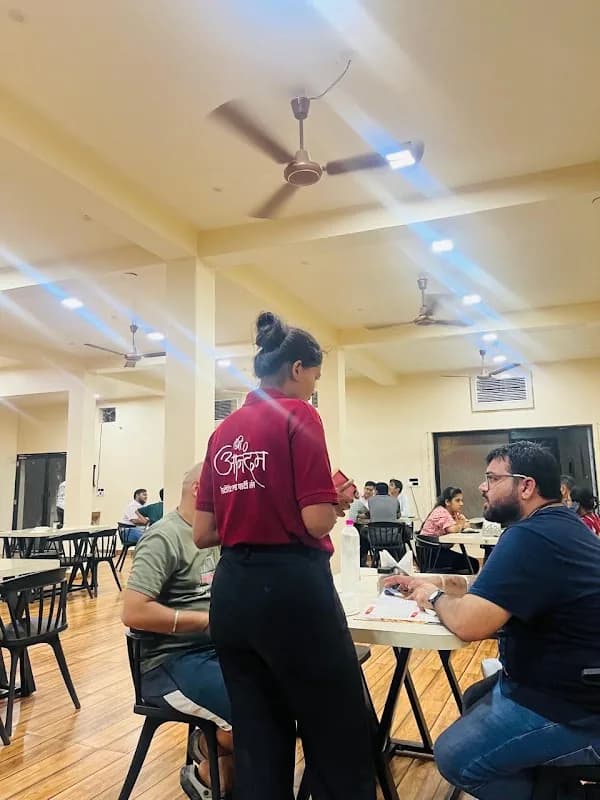 Spacious family dining room and pure vegetarian thali table at Shree Anandam Restaurant Kawardha